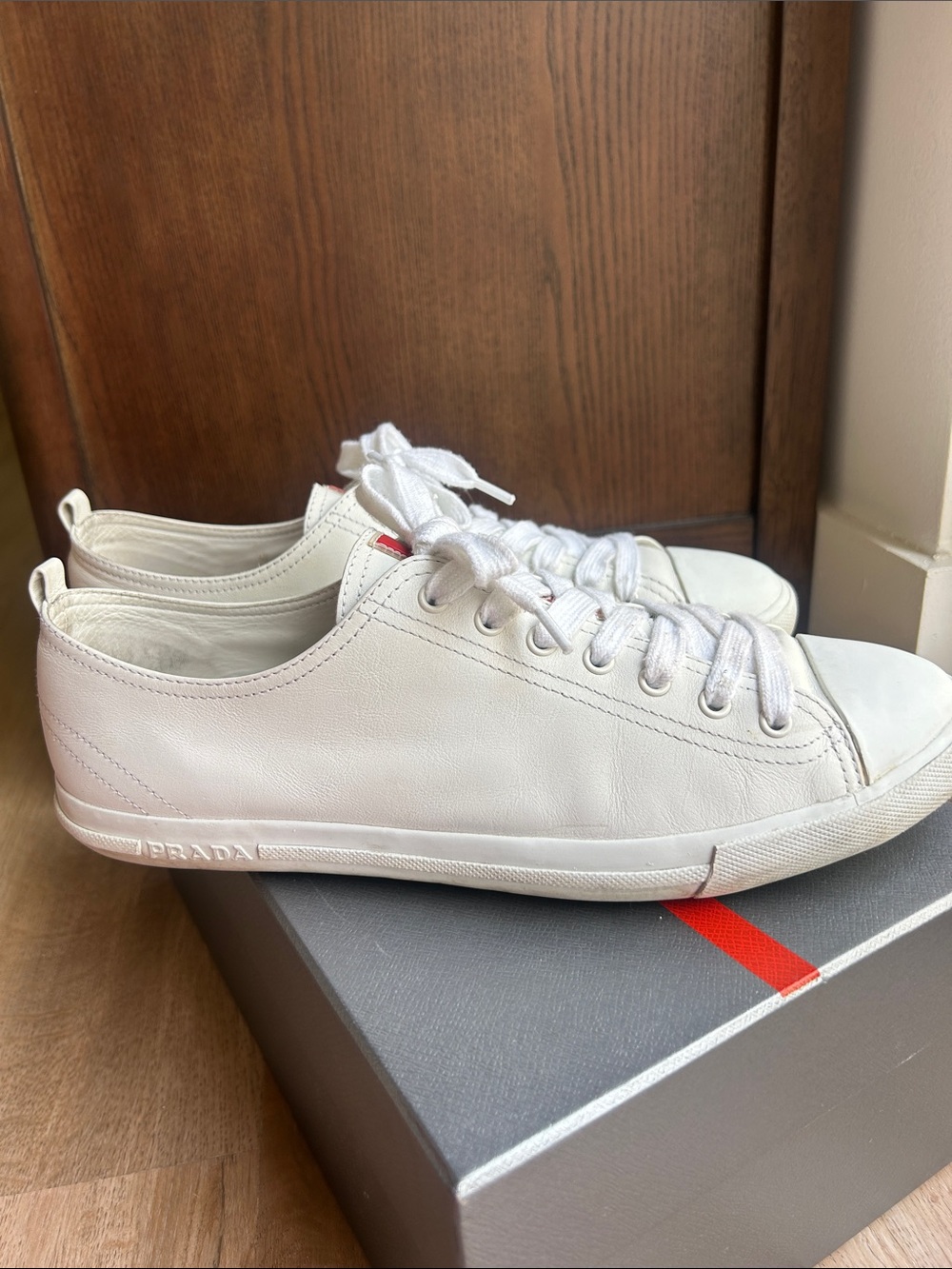 Prada White Leather Sneakers with Red Logo Detail - Picture 7 of 13